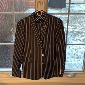 Paisley and Gray suit denim in color.